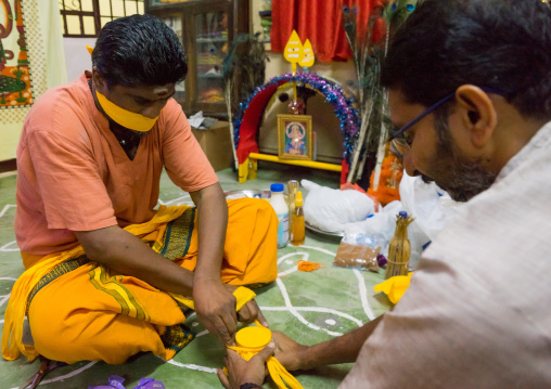 Hindu Devotee With His Mouth Gagged In Thaipusam Festival Preapring Offerings, Southeast Asia, Kuala Lumpur, Malaysia