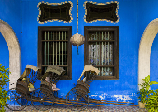 Bicycle Rickshaw In Front Of The Cheong Fatt Tze Chinese Mansion, George Town, Penang, Malaysia