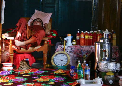 Buddhist Monk Sleeping In Nga Phae Kyaung, Inle Lake Jumping Cats Monastery Myanmar