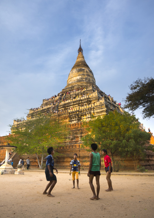 Kid Playing Chinlone In Front Of  Shwesandaw Pagoda, Bagan, Myanmar