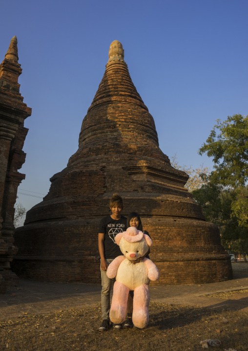 Young Couple In  Front Of An Old Temple, Bagan, Myanmar