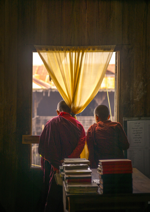 Novices Monks Looking Thru A Window, Inle Lake, Myanmar