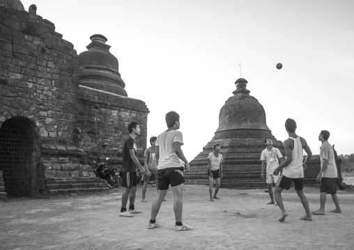 Men Playing Chinlone In Front Of Stupas, Myanmar