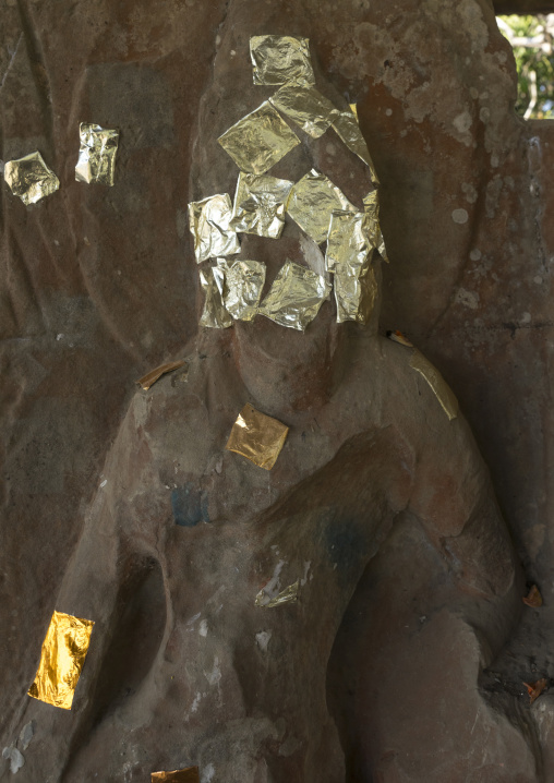 Decapitated Statue With Gold Leaves, Mrauk U, Myanmar