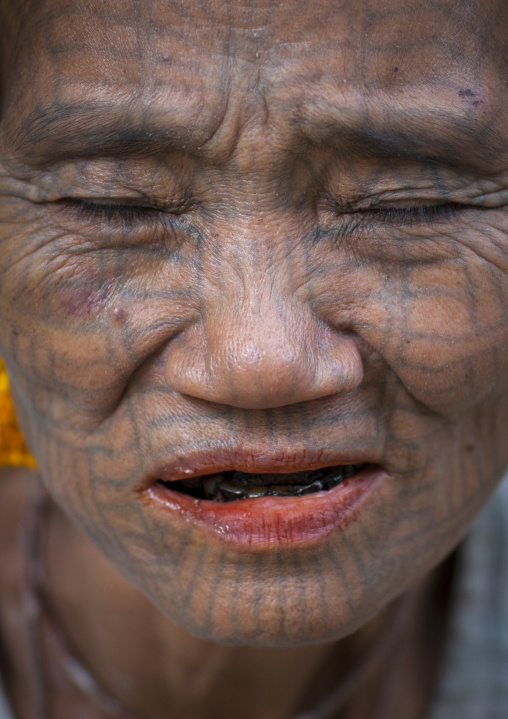 Tribal Chin Woman With Spiderweb Tattoo On The Face And Closed Eyes, Mrauk U, Myanmar