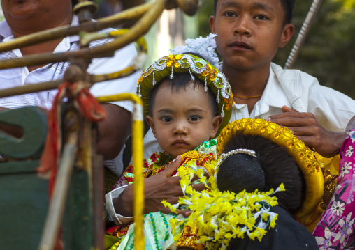 Child And Father During A Novitiation Parade, Bagan,  Myanmar