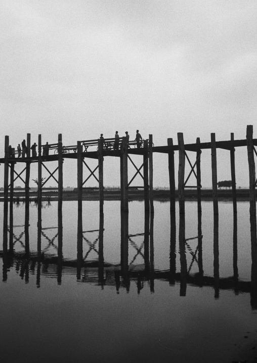 People Crossing U Bein Bridge In Amarapura, Mandalay, Myanmar
