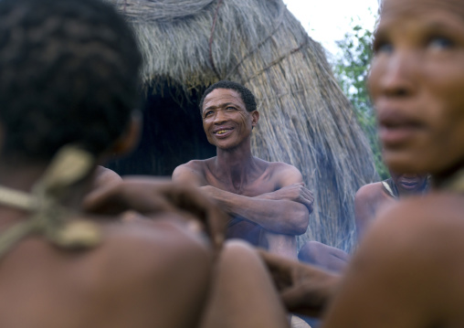 Bushman People Around A Fire In A Traditional Village, Tsumkwe, Namibia