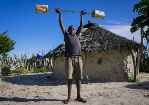 Young Man Exercising With Barbells, Ondangwa, Namibia