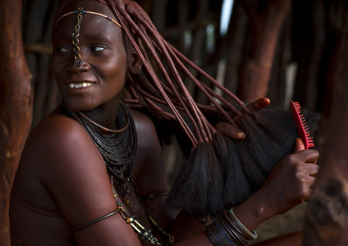 Himba Woman Taking Care Of Her Hair, Epupa, Namibia