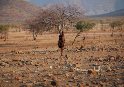 Himba Woman Carrying Her Baby On Her Back, Okapale Area, Namibia