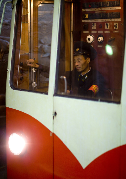 North Korean driver of a train in the subway, Pyongan Province, Pyongyang, North Korea