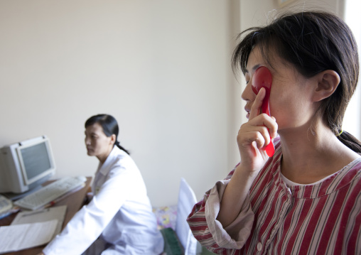 North Korean woman taking eye exam in an hospital, Pyongan Province, Pyongyang, North Korea