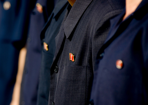 Kim il Sung badges on workers men suits, Pyongan Province, Pyongyang, North Korea