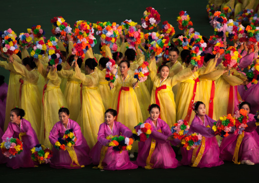 North Korean women dancing in choson-ot during the Arirang mass games in may day stadium, Pyongan Province, Pyongyang, North Korea