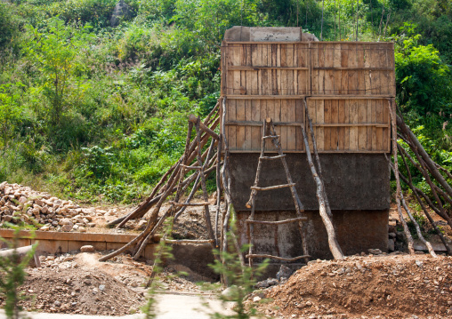 Construction of anti tank invasion concrete blocks on roadside, North Hwanghae Province, Sariwon, North Korea