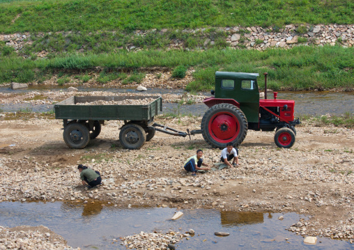 Old North Korean tractor in a field in the countryside, North Hwanghae Province, Sariwon, North Korea