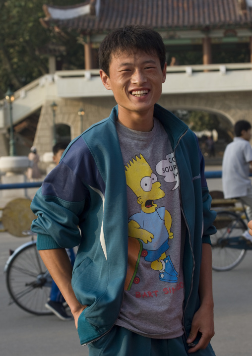 North Korean tennage boy with a bart simpson shirt, North Hwanghae Province, Sariwon, North Korea
