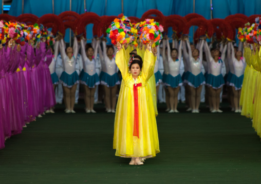 North Korean women dancing in choson-ot during the Arirang mass games in may day stadium, Pyongan Province, Pyongyang, North Korea
