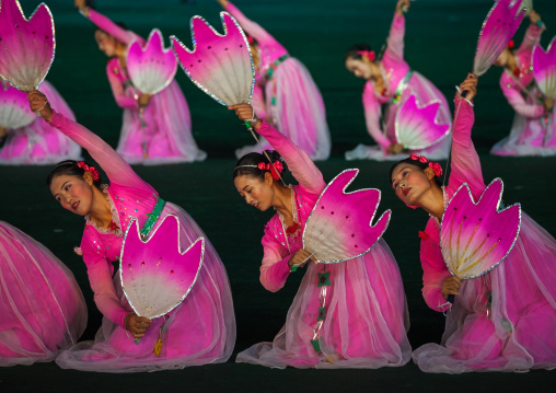 North Korean women dancing in choson-ot during the Arirang mass games in may day stadium, Pyongan Province, Pyongyang, North Korea