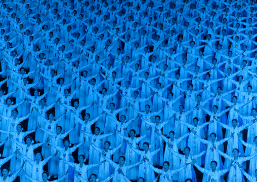 North Korean women dancing in choson-ot during the Arirang mass games in may day stadium, Pyongan Province, Pyongyang, North Korea