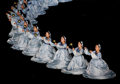 North Korean women dancing in choson-ot during the Arirang mass games in may day stadium, Pyongan Province, Pyongyang, North Korea