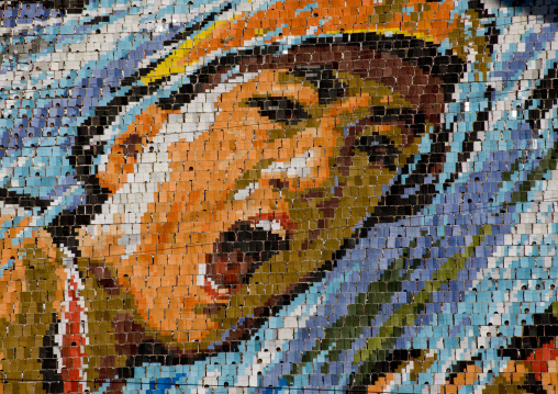 North Korean soldier made by children pixels holding up colored boards during Arirang mass games in may day stadium, Pyongan Province, Pyongyang, North Korea