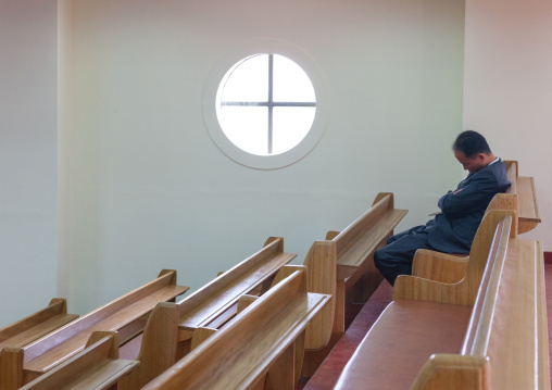 North Korean official sleeping in protestant Bongsu church, Pyongan Province, Pyongyang, North Korea
