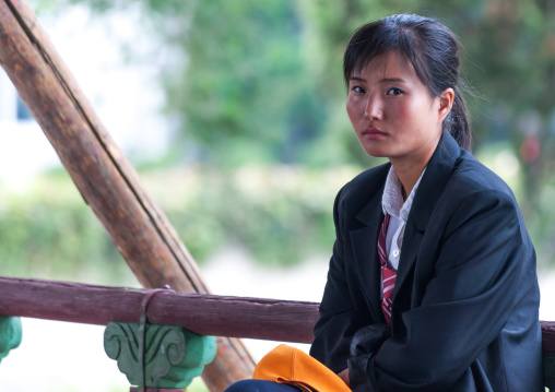 Portrait of a North Korean young woman in the street, Pyongan Province, Pyongyang, North Korea