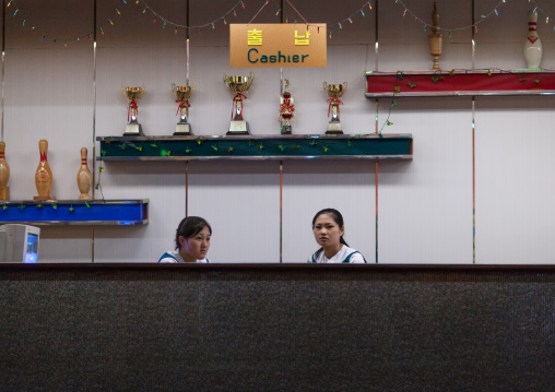 Bowling shoe rental counter with sports trophies, Pyongan Province, Pyongyang, North Korea