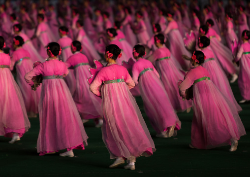 North Korean women dancing in choson-ot during the Arirang mass games in may day stadium, Pyongan Province, Pyongyang, North Korea