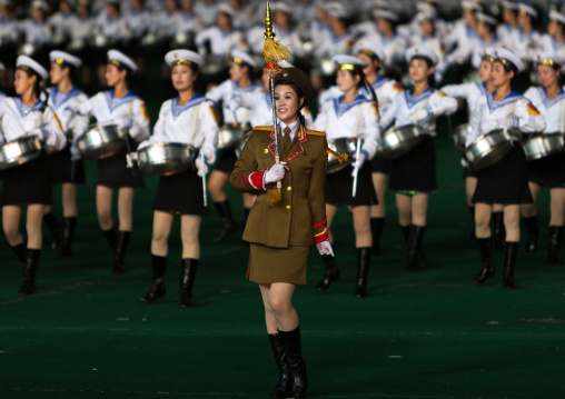 Sexy North Korean women dressed as soldiers dancing with swords during the Arirang mass games in may day stadium, Pyongan Province, Pyongyang, North Korea