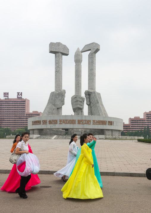 North Korean state artist performing on national day in front of the monument to Party founding, Pyongan Province, Pyongyang, North Korea