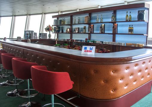 Empty bar in Yanggakdo international hotel with a cash billboard, Pyongan Province, Pyongyang, North Korea