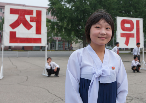 Propaganda billboards during a mass dance performance on september 9 day of the foundation of the republic, Pyongan Province, Pyongyang, North Korea