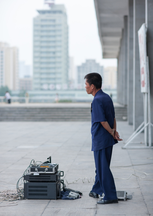 North Korean sound engineer during a mass dance performance on september 9 day of the foundation of the republic, Pyongan Province, Pyongyang, North Korea