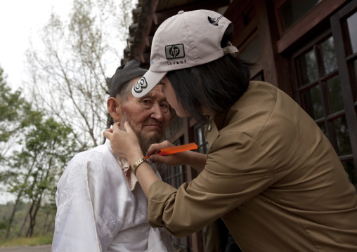 Old actor make-up during a movie shooting in Pyongyang film studios, Pyongan Province, Pyongyang, North Korea