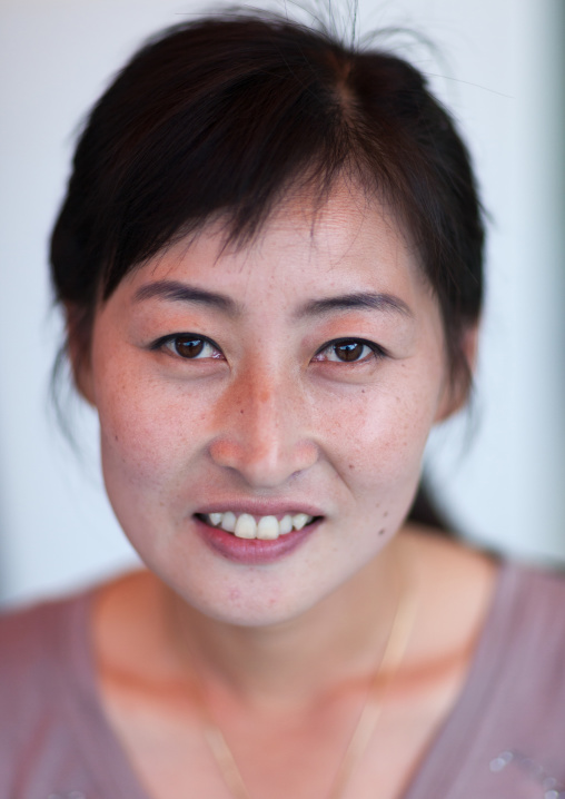 Portrait of a smiling North Korean woman, North Hwanghae Province, Kaesong, North Korea