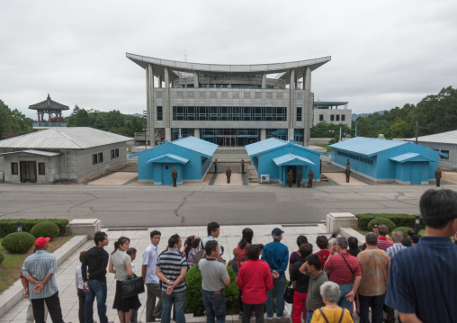 Tourists queueing to visit the conference room on the Demilitarized Zone, North Hwanghae Province, Panmunjom, North Korea