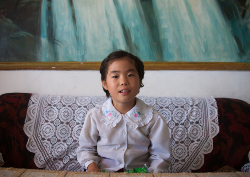Portrait of a North Korean girl inside her home, South Pyongan Province, Chonsam Cooperative Farm, North Korea