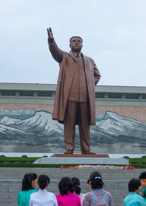 North Korean women paying respect to Kim il Sung statue in Mansudae Grand monument, Pyongan Province, Pyongyang, North Korea