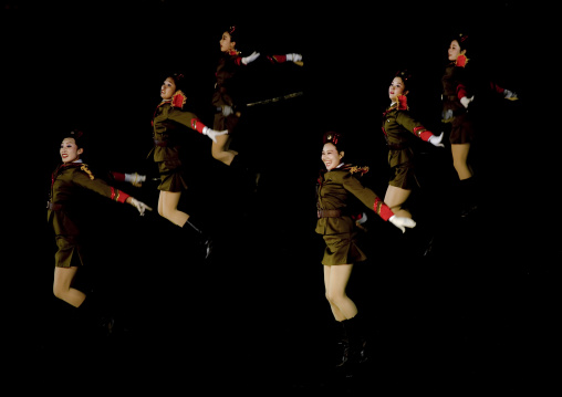 Sexy North Korean women dressed as soldiers dancing with swords during the Arirang mass games in may day stadium, Pyongan Province, Pyongyang, North Korea