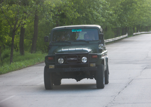 Old North Korean army jeep on the road, Pyongan Province, Myohyang-san, North Korea