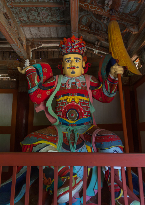 Colorful statue of damun-cheonwang heavenly king of the North at the Pohyon-sa Korean buddhist temple, North Pyongan Province, Myohyang-san, North Korea