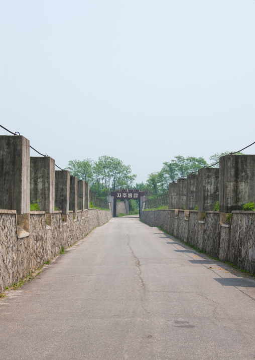 North Korean anti tank invasion concrete blocks on the roadside on the Demilitarized Zone, North Hwanghae Province, Panmunjom, North Korea