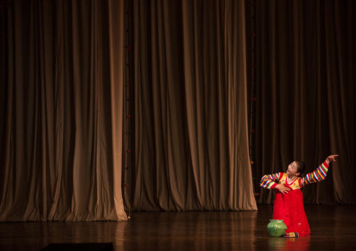 North Korean acrobat girl with a pottery on the stage of Mangyongdae children's palace, Pyongan Province, Pyongyang, North Korea