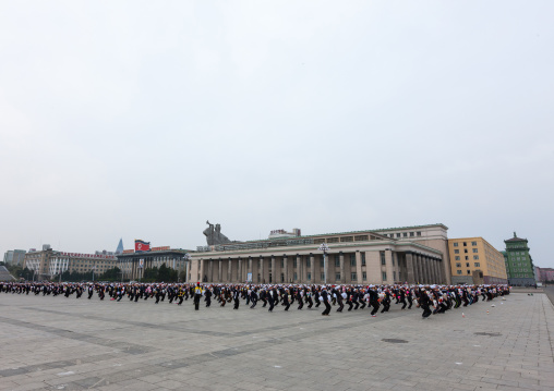 Young North Korean women during a mass games rehearsal in Kim il Sung square, Pyongan Province, Pyongyang, North Korea
