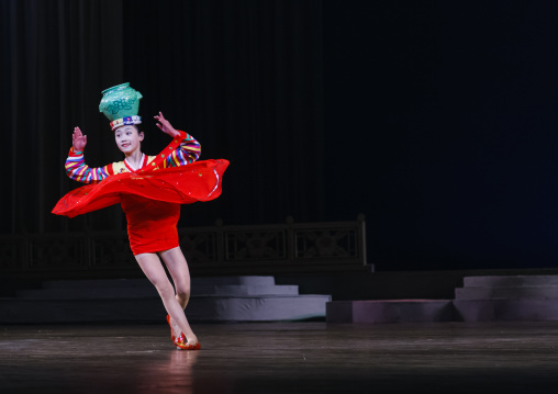 North Korean acrobat girl with a pottery on the stage of Mangyongdae children's palace, Pyongan Province, Pyongyang, North Korea