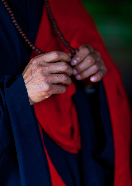 North Korean monk' hands in Pohyon-sa Korean buddhist temple, Hyangsan county, Mount Myohyang, North Korea