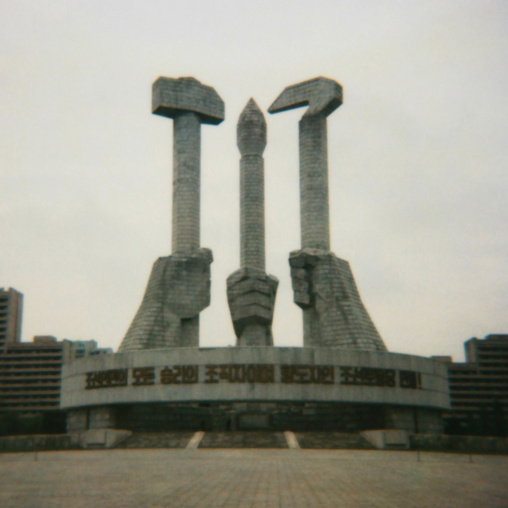 Polaroid of the monument to Party founding made for the 50-year anniversary of the workers' Party of Korea, Pyongan Province, Pyongyang, North Korea